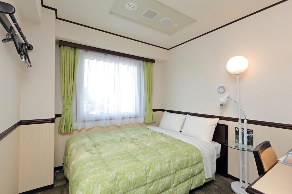 Toyoko Inn Osaka Umeda Nakatsu No.1 Rum bild
